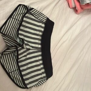 Lululemon size 4 teal and black speed up shorts